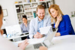 group-of-business-people-working-as-team-in-office-TRCKLYU.jpg